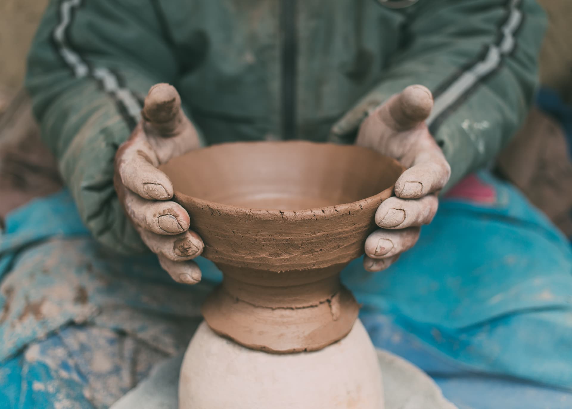 Traditional potter making pottery in Likir village